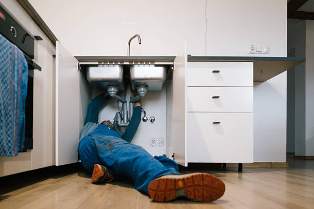 Professional Emergency Plumber technician working in Belleview, FL